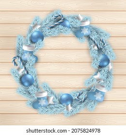Christmas holidays. Christmas wreath on  wooden texture background.

