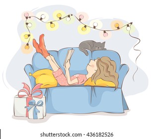 Christmas Holidays/Young woman or girl is lying on the sofa reading a book, near cat sleeps. All wait the holiday.