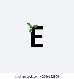 Christmas holy leaf and bells Letter E logo design