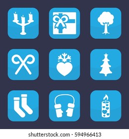christmas icon. Set of 9 filled christmas icons such as gift, socks, mittens, tree, candle, heart frozen, christmas tree, candy cane
