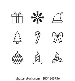 Christmas Icon Set. Festive set of Icons. Modern simple outline icons for Christmas Xmas Festivities. Vector Decoration Symbols. Present, Snowflake, Santa hat, Christmas Tree, Candy Cane, Bauble etc. 