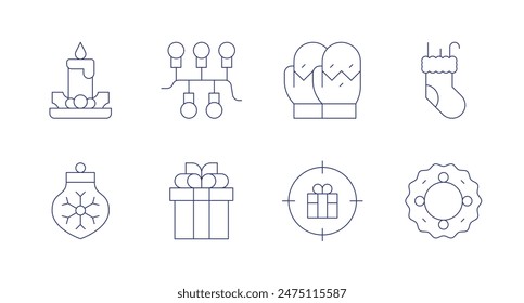 Christmas icons. Editable stroke. Containing bauble, candle, christmassock, christmaswreath, gift, lights, mitten, present.