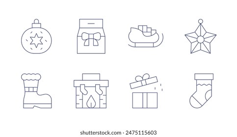 Christmas icons. Editable stroke. Containing bauble, boot, fireplace, gift, present, sled, sock, star.