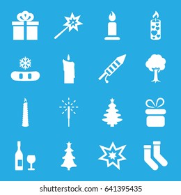 Christmas icons set. set of 16 christmas filled icons such as present, candle, socks, tree, sparkler, fireworks, gift, wine glass and bottle, sparklers