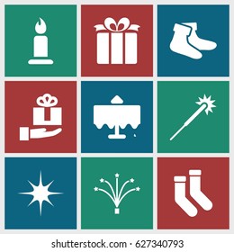 Christmas icons set. set of 9 christmas filled icons such as restaurant table, candle, sparklers, socks, present, star, fireworks