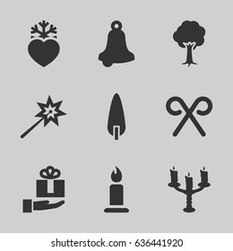 Christmas icons set. set of 9 christmas filled icons such as candle, tree, pine-tree, heart frozen, candy cane, candlestick, gift on hand, sparklers