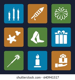 Christmas icons set. set of 9 christmas filled icons such as candle, sparklers, socks, present, fireworks, cookie