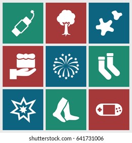 Christmas icons set. set of 9 christmas filled icons such as socks, tree, portable console, fireworks, cookie
