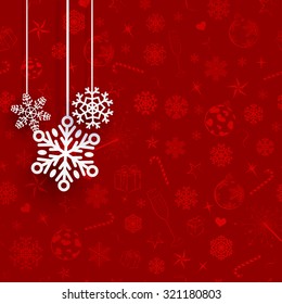 Christmas illustration with hanging snowflakes on red background of Xmas symbols
