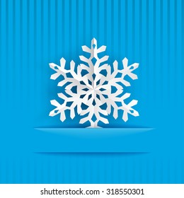 Christmas illustration with one big white snowflake cut out of paper on light blue striped background