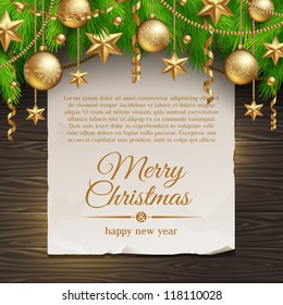 Christmas illustration - paper banner with greeting and Christmas tree branches with golden decoration