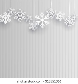 Christmas illustration with several hanging snowflakes on gray striped background