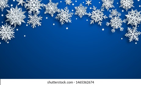 Christmas illustration of white complex paper snowflakes with soft shadows on blue background