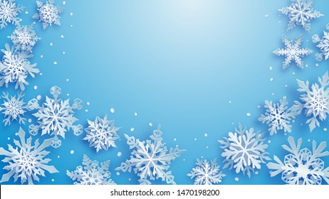 Christmas illustration of white complex paper snowflakes with soft shadows on light blue background