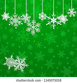 Christmas illustration with white hanging snowflakes on green background