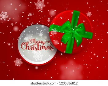 Christmas inscription in the open red gift box with green ribbon and bow with falling snow isolated on red background. Top view. Vector illustration.