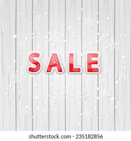 Christmas inscription sale with snowflakes and confetti on wooden background, illustration.