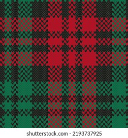 Christmas jacquard knitted seamless pattern. Plaid checkered red and green. Colorful vector illustration.