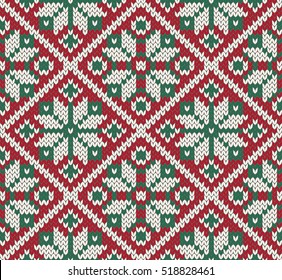 Christmas jacquard knitted seamless pattern. Green, red and white background. Scandinavian winter style. Vector illustration.
