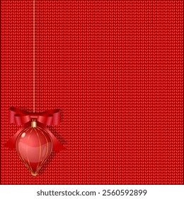 Christmas knitted background with Christmas ball and bow