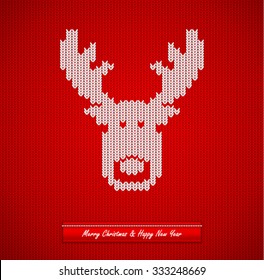 Christmas knitted background with deer