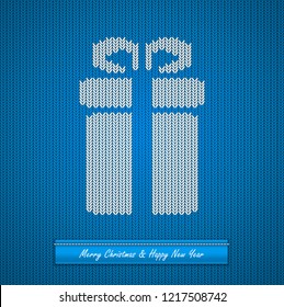 Christmas knitted background with gift