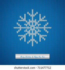 Christmas knitted background with snowflake