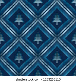 Christmas knitted pattern. Winter geometric seamless pattern. Design for sweater, scarf, comforter or clothes texture. Vector illustration.