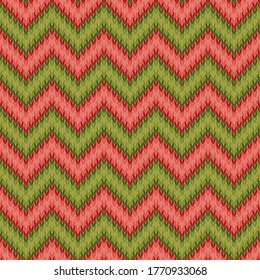 Christmas knitted seamless pattern. Green and red zigzag. Textile geometric ornament