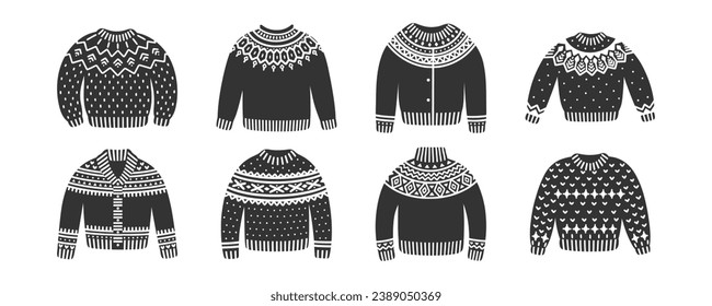 Christmas knitted sweaters, vector set of icons. Winter holiday illustrations of cute jumpers with white ornaments on black silhouettes. Collection of warm pullovers.