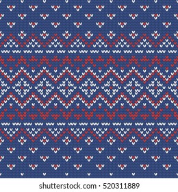Christmas knitting seamless pattern in Blue, Red and White. Perfect for wallpaper, wrapping paper, pattern fills, winter greetings, web page background, Christmas and New Year greeting cards