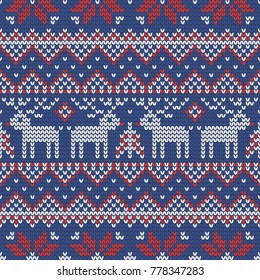 Christmas knitting seamless pattern with deers, stars and zig zag. Perfect for wallpaper, wrapping paper, web page background, New Year greeting cards