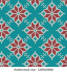 Christmas knitting seamless pattern with geometrical snowflakes. Knitted blue sweater design.