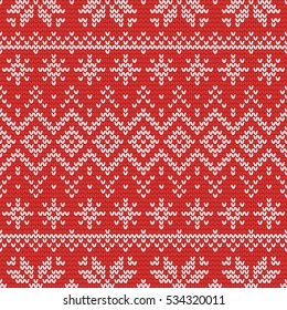 Christmas knitting seamless pattern with nordic ornament. Perfect for wallpaper, wrapping paper, pattern fills, winter greetings, web page background, Christmas and New Year greeting cards