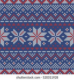 Christmas knitting seamless pattern in Red, Blue and White. Perfect for wallpaper, wrapping paper, pattern fills, winter greetings, web page background, Christmas and New Year greeting cards