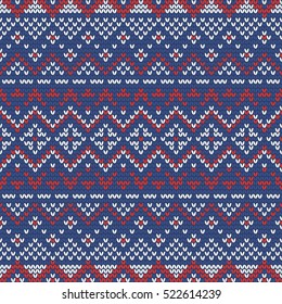 Christmas knitting seamless pattern in Red, Blue and White. Perfect for wallpaper, wrapping paper, pattern fills, winter greetings, web page background, Christmas and New Year greeting cards