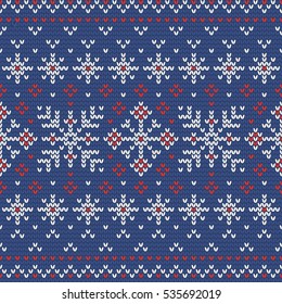 Christmas knitting seamless pattern in Red, Blue and White. Perfect for wallpaper, wrapping paper, pattern fills, winter greetings, web page background, Christmas and New Year greeting cards