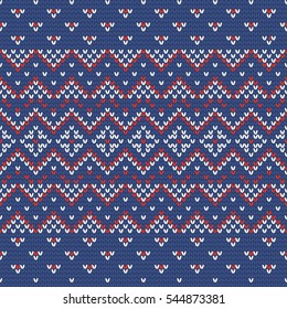 Christmas knitting seamless pattern in Red, Blue and White. Perfect for wallpaper, wrapping paper, web page background, New Year greeting cards