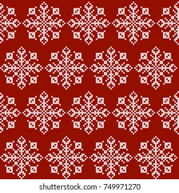 Christmas knitting seamless pattern in red and white,with snowflakes.