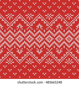 Christmas knitting seamless pattern with rhombus in Red and White. Perfect for wallpaper, wrapping paper, pattern fills, winter greetings, web page background, Christmas and New Year greeting cards