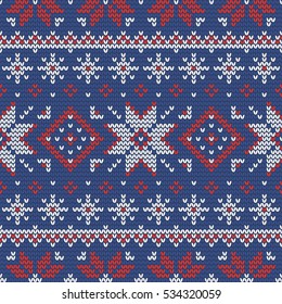 Christmas knitting seamless pattern with rhombus and stars. Perfect for wallpaper, wrapping paper, pattern fills, winter greetings, web page background, Christmas and New Year greeting cards