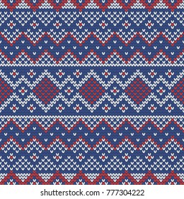 Christmas knitting seamless pattern with rhombus, stripes and triangles. Perfect for wallpaper, wrapping paper, web page background, New Year greeting cards