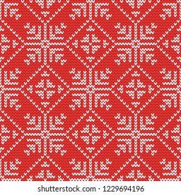 Christmas knitting seamless pattern with snowflake and rhombus. Perfect for wallpaper, wrapping paper, web page background, New Year greeting cards