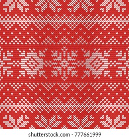 Christmas knitting seamless pattern with snowflake and stars. Perfect for wallpaper, wrapping paper, web page background, New Year greeting cards