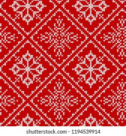 Christmas knitting seamless pattern with snowflakes. Knitted sweater design. Christmas knit geometric ornament.