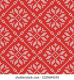 Christmas knitting seamless pattern with snowflakes, stars and rhombus. Perfect for wallpaper, wrapping paper, web page background, New Year greeting cards