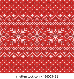 Christmas knitting seamless pattern with snowflakes and dots. Perfect for wallpaper, wrapping paper, pattern fills, winter greetings, web page background, New Year greeting cards