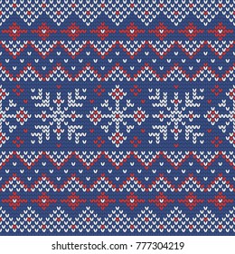 Christmas knitting seamless pattern with snowflakes, stripes and zig zag. Perfect for wallpaper, wrapping paper, web page background, New Year greeting cards