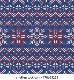 Christmas knitting seamless pattern with snowflakes, triangles and zig zag. Perfect for wallpaper, wrapping paper, web page background, New Year greeting cards
