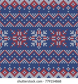 Christmas knitting seamless pattern with snowflakes, zig zag and rhombus. Perfect for wallpaper, wrapping paper, web page background, New Year greeting cards